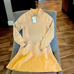Little girls sz 7 dress tan w/gold around cuffs and bottom new with tags.